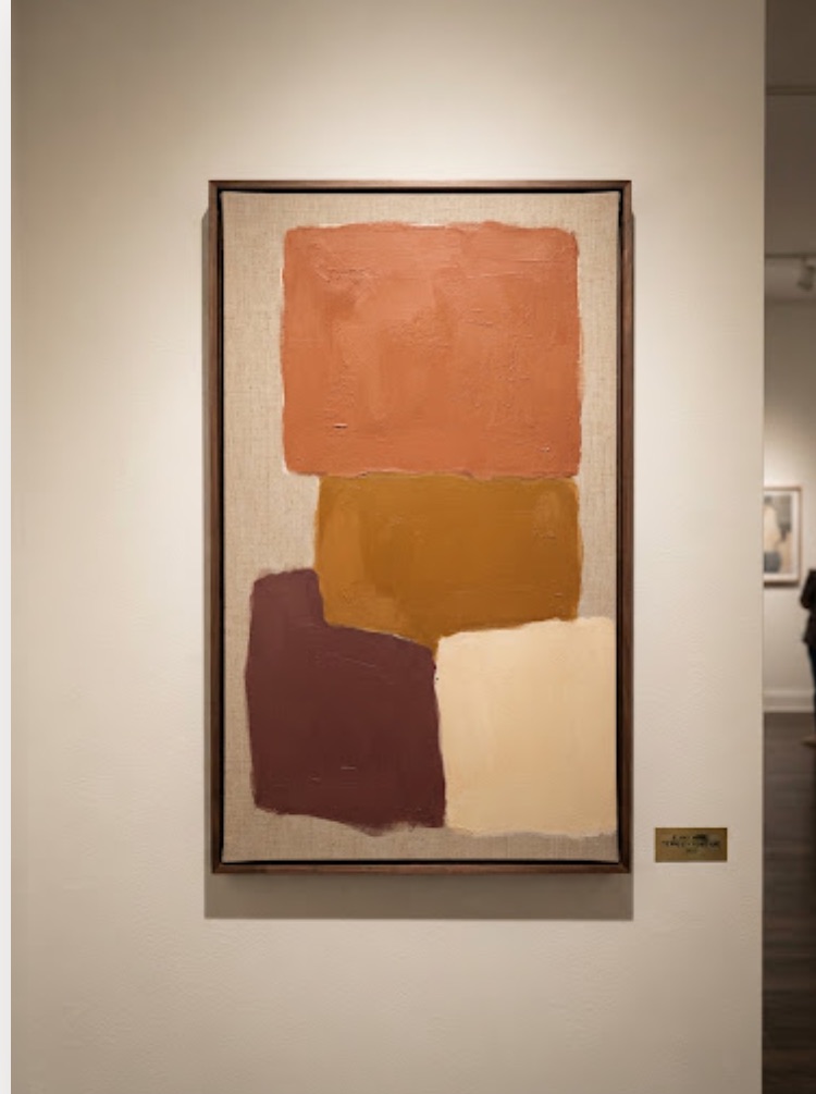 Placeholder photograph of a framed abstract painting hanging on a gallery wall, standing in for an image of Greg Angus's work.